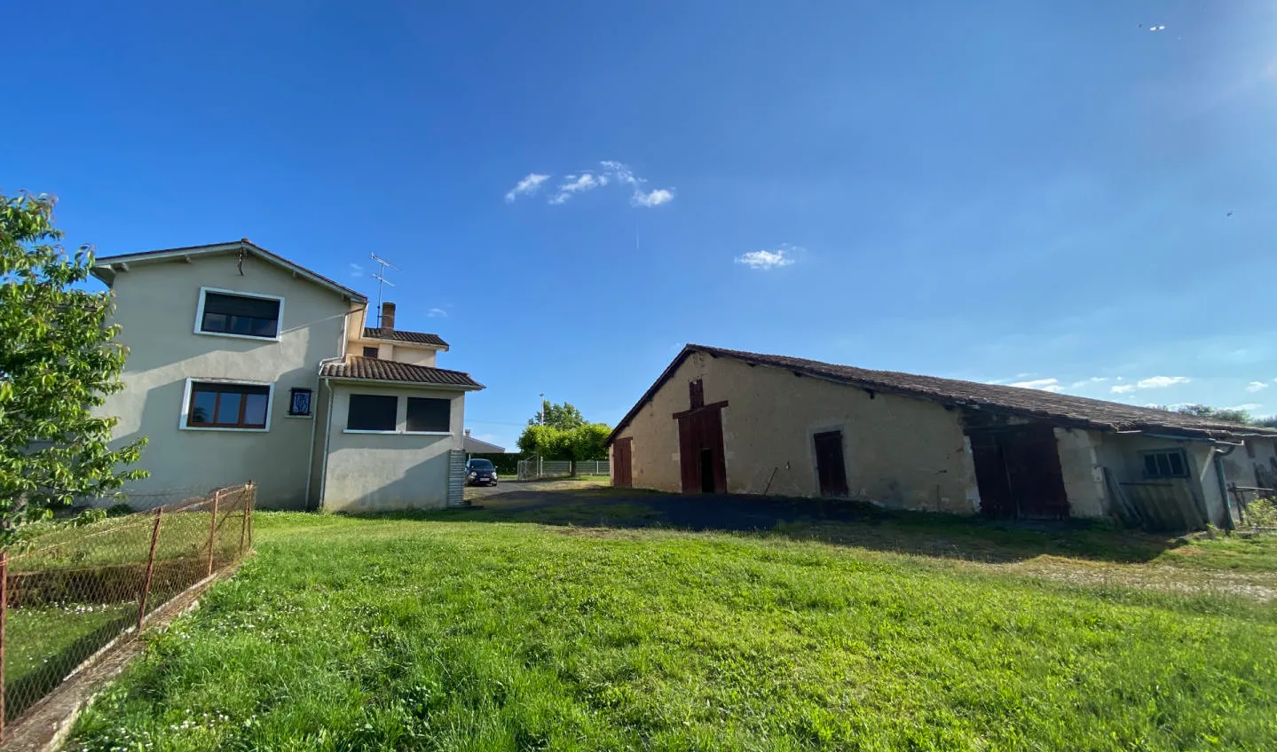 Spacious house with huge outbuildings and enclosed grounds. Bedroom on the ground floor. Shops on foot.