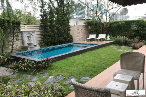 Außergewöhnliches Haus mit drei Schlafzimmern und zwei Etagen, üppigem Garten und privatem Pool in Sukhumvit 63