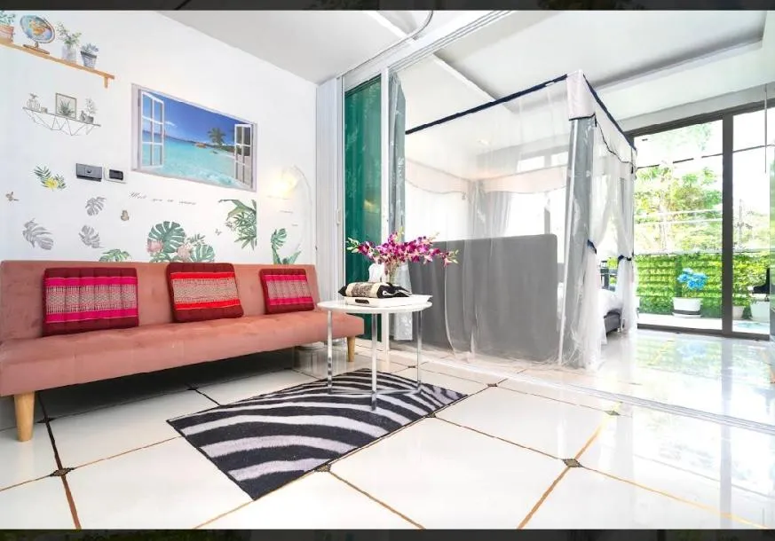 Nakaley Palm - Um condomínio de um quarto com sofá-cama e vista mar para alugar