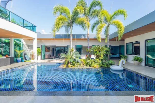 Laguna'da Ekstralı Çağdaş Dört Yatak Odalı Havuzlu Villa Satılık